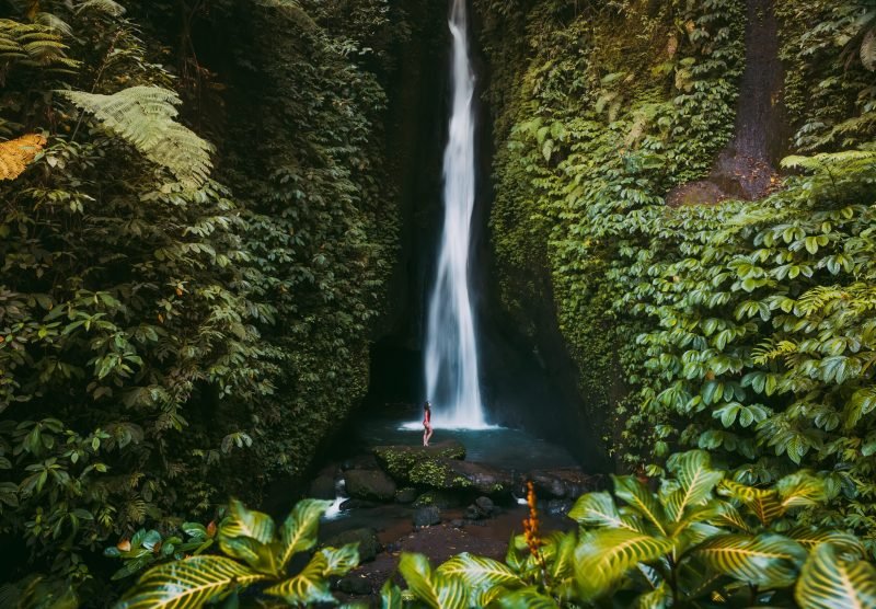 Waterfall,In,Tropical,Jungle,And,Alone,Woman,In,Bikini.,Leke