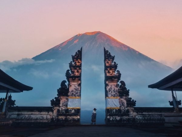 Traveler Standing at the Gates of Pura Lempuyang Temple aka Gates of Heaven Bali, Indonesia